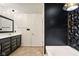 Well-lit bathroom with modern vanity, framed mirror, and updated fixtures at 1454 Silver Pine Ln, Sheridan, IN 46069