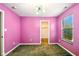 Pink bedroom with carpet and lots of natural light coming from the windows at 1454 Silver Pine Ln, Sheridan, IN 46069
