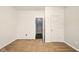 Spacious bedroom with plush carpeting and doorway leading to other rooms at 1454 Silver Pine Ln, Sheridan, IN 46069