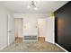 Bedroom with modern light fixture and closet doors at 1454 Silver Pine Ln, Sheridan, IN 46069