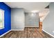 Spacious living room with beautiful laminate flooring and neutral color scheme at 1454 Silver Pine Ln, Sheridan, IN 46069