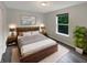 Cozy bedroom with a comfortable bed, soft lighting, and minimalist decor at 15110 Fawn Hollow Ln, Noblesville, IN 46060