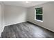Well-lit bedroom featuring sleek floors and bright natural light at 15110 Fawn Hollow Ln, Noblesville, IN 46060