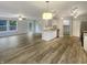Spacious living room with stainless steel appliances and an adjacent patio at 15110 Fawn Hollow Ln, Noblesville, IN 46060