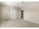 Carpeted bedroom with neutral tones, closet and connecting doors at 15421 Bowie Dr, Westfield, IN 46074