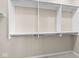 Closet with neutral tones and several shelves and clothing rods at 15421 Bowie Dr, Westfield, IN 46074
