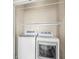 Laundry room with a white front load washer and dryer at 15421 Bowie Dr, Westfield, IN 46074