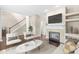 Spacious living room with a fireplace, open layout, and stylish decor at 15421 Bowie Dr, Westfield, IN 46074