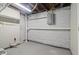 Unfinished basement featuring painted cinderblock walls and overhead lighting at 1720 Woodlawn Ave, Indianapolis, IN 46203