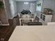 Open-concept dining area with view of billiards room, seamlessly connects to the kitchen area at 1733 E 47Th St, Anderson, IN 46013