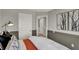 Tastefully decorated bedroom with a gray and charcoal color scheme and cozy finishes at 17717 Remy Rd, Noblesville, IN 46062