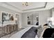 Serene bedroom with a comfortable bed, dresser, and soft lighting at 17717 Remy Rd, Noblesville, IN 46062
