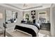 Spacious bedroom with large windows, stylish decor, and ample natural light at 17717 Remy Rd, Noblesville, IN 46062