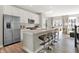 Modern kitchen featuring a large kitchen island, stainless steel appliances and an open floorplan at 17717 Remy Rd, Noblesville, IN 46062