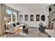 A modern living room with natural light, contemporary decor, and comfortable seating at 17717 Remy Rd, Noblesville, IN 46062