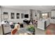 Open concept living spaces showcasing the kitchen, dining area, and living room with modern decor at 17717 Remy Rd, Noblesville, IN 46062