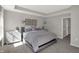 Inviting main bedroom with a tray ceiling, neutral color palette, and plenty of natural light at 17721 Remy Rd, Noblesville, IN 46062