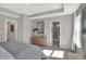 Beautifully designed main bedroom, featuring a tray ceiling and adjacent Primary bathroom at 17721 Remy Rd, Noblesville, IN 46062