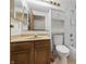 Standard sized bathroom with shower/tub combo, vanity and cabinetry at 1826 Shorter Dr, Indianapolis, IN 46214