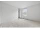 Bedroom with carpet, window view, and an open closet at 1826 Shorter Dr, Indianapolis, IN 46214
