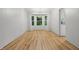 Bright dining area with large bay window, light wood floors, and open access to the kitchen at 1826 Shorter Dr, Indianapolis, IN 46214