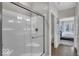 Modern bathroom featuring a glass-enclosed shower and access to the toilet area at 19390 Mcbee Ave, Westfield, IN 46074