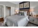 Comfortable bedroom featuring stylish decor and a view into the closet space at 19390 Mcbee Ave, Westfield, IN 46074