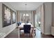 Dining room with modern chandelier and large windows providing natural light at 19390 Mcbee Ave, Westfield, IN 46074