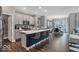 Spacious kitchen with large island, stainless steel appliances, and open access to the dining and living areas at 19390 Mcbee Ave, Westfield, IN 46074