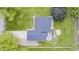 Aerial view of a well-maintained home featuring a beautiful roof, patio and lush landscaping at 203 Leerkamp Dr, Franklin, IN 46131