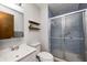 Cozy bathroom featuring a glass enclosed shower, floating shelves and modern fixtures at 203 Leerkamp Dr, Franklin, IN 46131