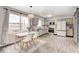 Bright kitchen features dining area and modern appliances at 203 Leerkamp Dr, Franklin, IN 46131