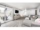 Bright living room with sliding glass door to the patio, plush seating, and neutral tones at 203 Leerkamp Dr, Franklin, IN 46131