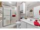 Bright bathroom featuring a glass-enclosed shower and white vanity at 2044 Flamingo Way, Franklin, IN 46131