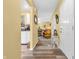 Open hallway with views into the kitchen and living room, offering a seamless transition at 2044 Flamingo Way, Franklin, IN 46131