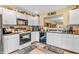 Well-appointed kitchen with sleek appliances, a sink, and ample counter space at 2044 Flamingo Way, Franklin, IN 46131