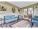 Covered patio features ample seating and sliding glass doors into the home at 2044 Flamingo Way, Franklin, IN 46131