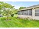 Inviting screened-in porch provides a serene space to relax and enjoy the peaceful backyard view at 2044 Flamingo Way, Franklin, IN 46131