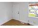 Clean entryway with an open view to the front exterior and natural light at 2046 N Tibbs Ave, Indianapolis, IN 46222
