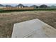 Spacious backyard featuring a concrete patio, perfect for outdoor entertaining at 2287 Oakmont Dr, Plainfield, IN 46168
