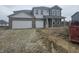 New two-story home with a brick-accented front and a two-car garage at 2287 Oakmont Dr, Plainfield, IN 46168
