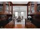 Open concept dining room showcases beautiful built-ins and seamless flow with kitchen at 24 Shannon Rd, Zionsville, IN 46077