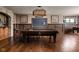 A well-appointed game room features a pool table, ample lighting, and stylish decor for leisure and entertainment at 24 Shannon Rd, Zionsville, IN 46077