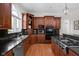 Gourmet kitchen with stainless steel appliances and granite counters, modern and functional at 24 Shannon Rd, Zionsville, IN 46077