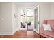 Cozy reading room with an entrance to an outdoor patio space and natural light at 24 Shannon Rd, Zionsville, IN 46077