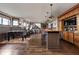 Spacious recreation room with a wet bar, foosball table, and wood floors offers great entertainment at 24 Shannon Rd, Zionsville, IN 46077