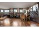 Recreation room with wooden floors, foosball table, comfortable seating and natural lighting at 24 Shannon Rd, Zionsville, IN 46077