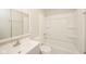 Clean bathroom featuring a combination shower and bathtub, sink, and mirrored medicine cabinet at 2726 Apache Dr, Anderson, IN 46012