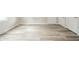 Bright bedroom with clean white walls, modern flooring and two closets at 2726 Apache Dr, Anderson, IN 46012