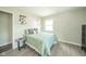 Comfortable bedroom with a cozy bed, side table, and serene ambiance at 2726 Apache Dr, Anderson, IN 46012